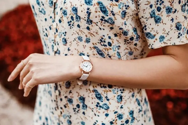 Woman's wrist with an elegant Aethel timepiece.