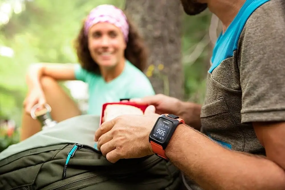 Adventurer wearing a durable Aethel watch outdoors.