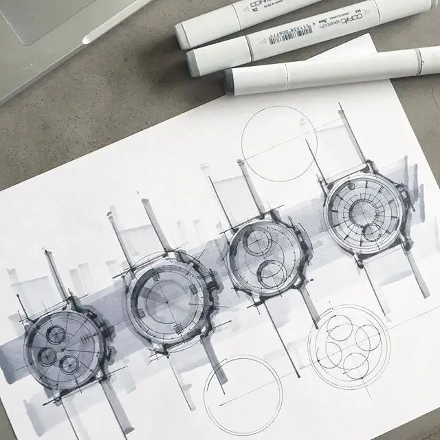 A designer sketching a watch on paper.
