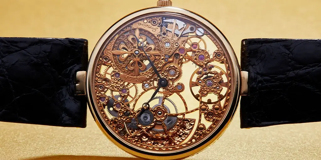 A close-up of a skeleton dial watch.
