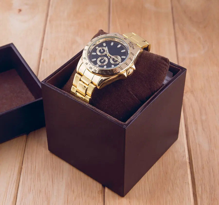 A luxury watch displayed in an elegant gift box.